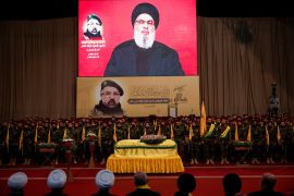 Hezbollah leader Hassan Nasrallah addresses his supporters via a video display on August 1, 2024, during the funeral of senior Hezbollah commander Fuad Shukr, who was killed in an Israeli strike in Beirut&#039;s southern suburbs [Alkis Konstantinidis/Reuters]