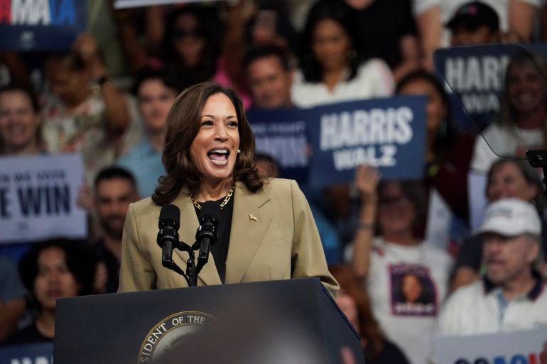 Kamala Harris smiles during a rally