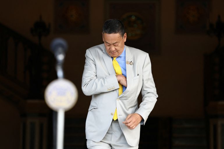 Recently dismissed Thailand's Prime Minister, Srettha Thavisin walks to address members of media after Thailand's Constitutional Court ruled on dismissal case at the Government House, in Bangkok, Thailand, August 14, 2024. REUTERS/Chalinee Thirasupa