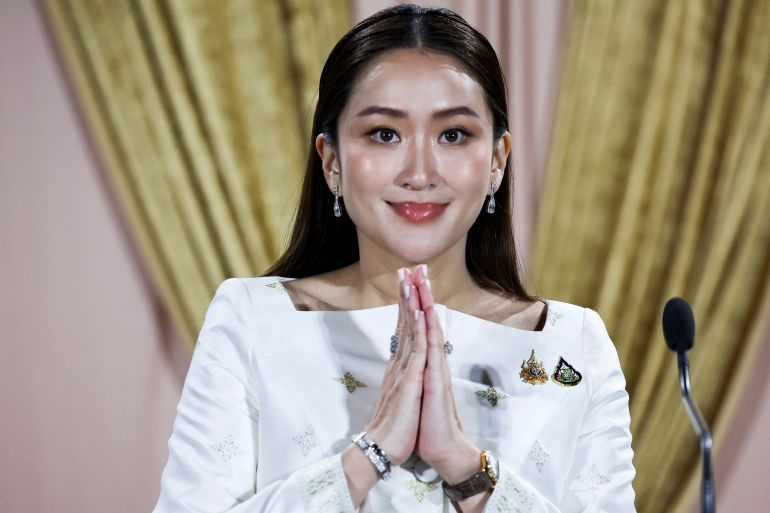 Thailand's Prime Minister Paetongtarn Shinawatra attends a press conference at the Pheu Thai party headquarters following a royal endorsement ceremony in Bangkok, Thailand