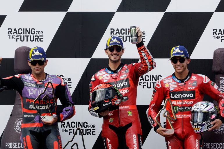 MotoGP riders celebrate on podium