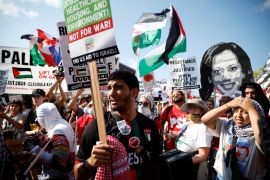 People attend a &#039;March on the DNC&#039; on the sidelines of the Democratic National Convention in Chicago on August 19 [Marco Bello/Reuters]