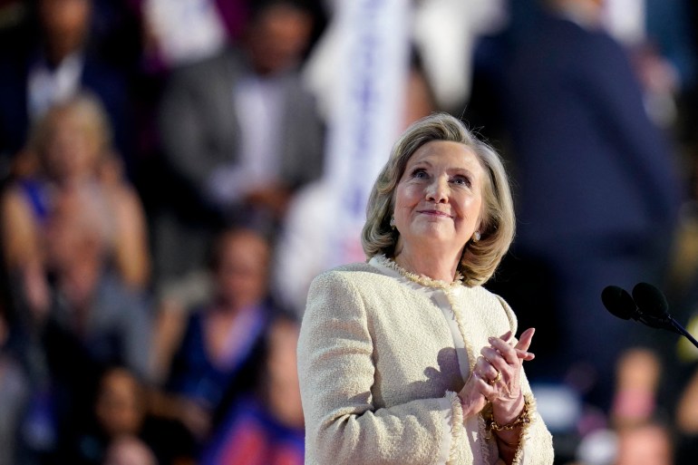 Hillary Clinton looks at the crowd from the DNC stage.