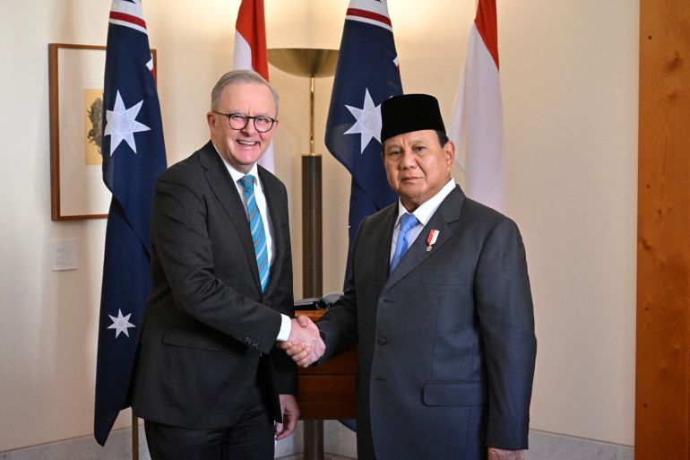 Indonesia's President-elect Prabowo Subianto meets with Australia's Prime Minister Anthony Albanese at Parliament House in Canberra, Australia, August 20, 2024. AAP Image/Mick Tsikas via REUTERS ATTENTION EDITORS - THIS IMAGE WAS PROVIDED BY A THIRD PARTY. NO RESALES. NO ARCHIVE. AUSTRALIA OUT. NEW ZEALAND OUT. NO COMMERCIAL OR EDITORIAL SALES IN NEW ZEALAND. NO COMMERCIAL OR EDITORIAL SALES IN AUSTRALIA.