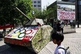 A mock-up of a tank is seen during a demonstration in Paris on June 06, 2024, calling for Israel to be banned from the 2024 Paris Olympics over its human rights violations in Gaza [İbrahim Ezzat/Anadolu]