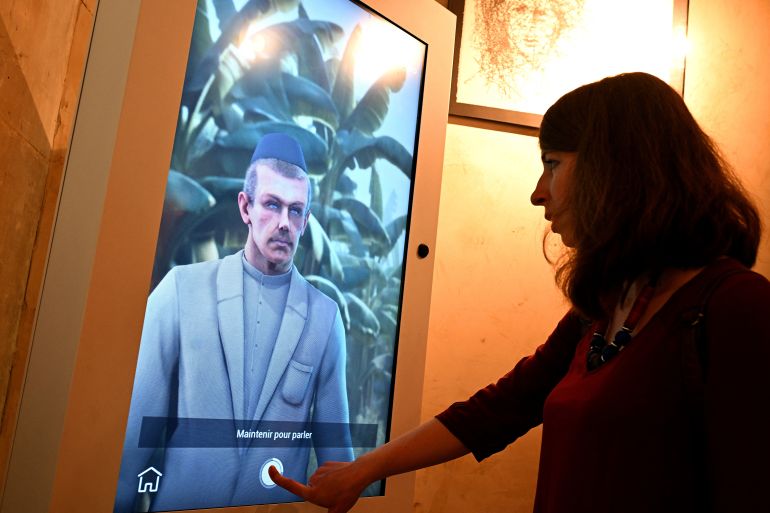 A visitor interacts with the "digital twin"