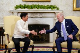 US President Joe Biden shakes hands with Philippine President Ferdinand Marcos Jr at the White House on May 1, 2023 [Carolyn Kaster/AP]